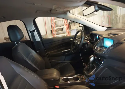 2014 Ford Escape Titanium z USA, uszkodzony, nr VIN 1FMCU0JX5EUA83417